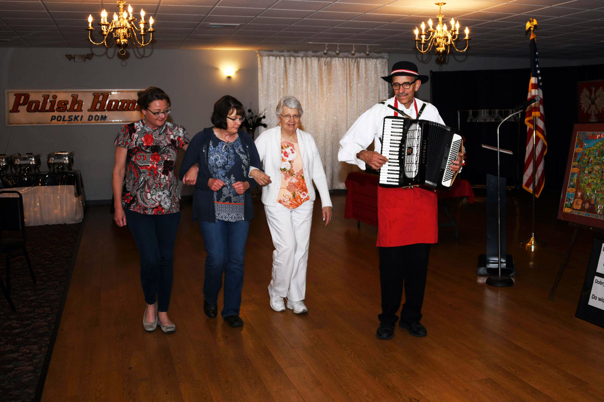 039 Tom Jodlowski teaches Jenny Gibbs, Mary Folkerts and JoAnn Kuester a Polish folk dance.JPG